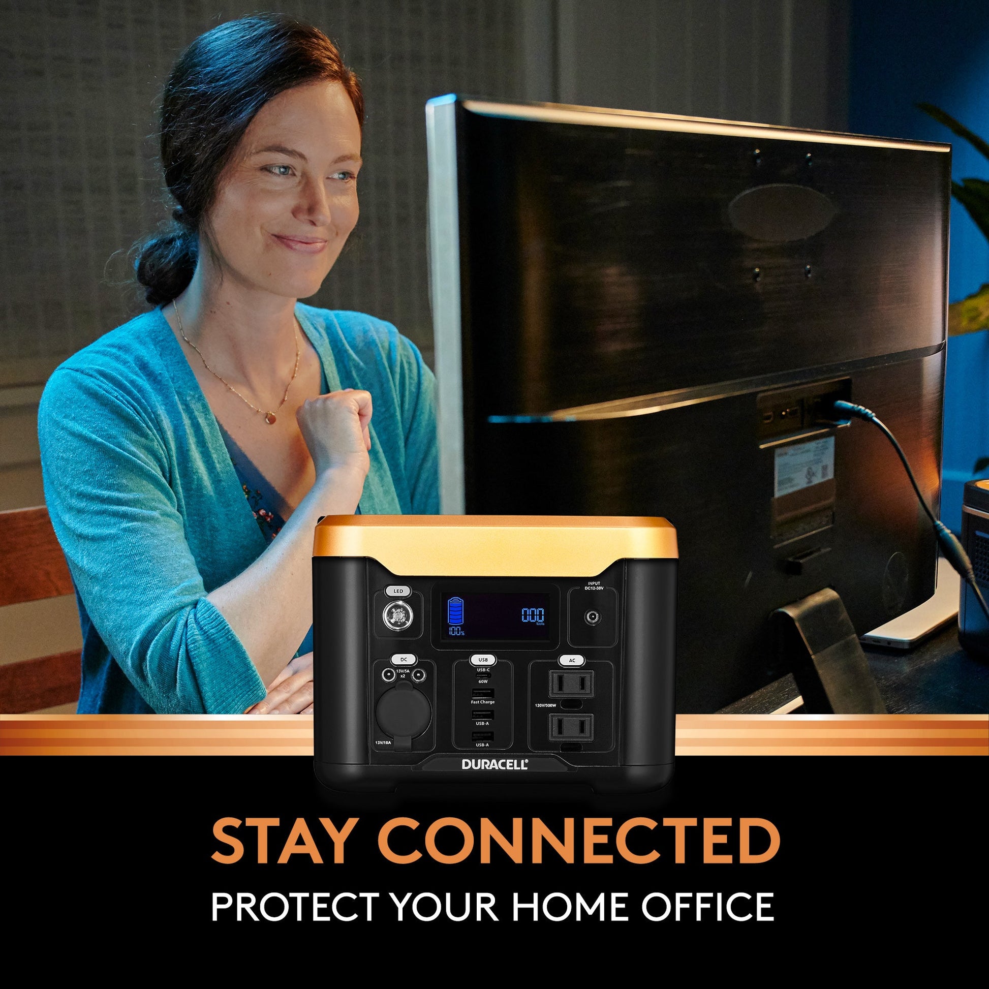  Image of a woman who is able to work on her computer in a power outage thanks to her power station.