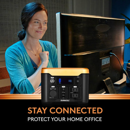  Image of a woman who is able to work on her computer in a power outage thanks to her power station.