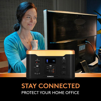 Image of a woman who is able to work on her computer in a power outage thanks to the Power 1000.